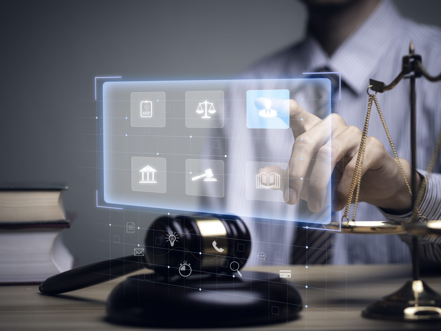 Justice system technology overlay with scales and gavel